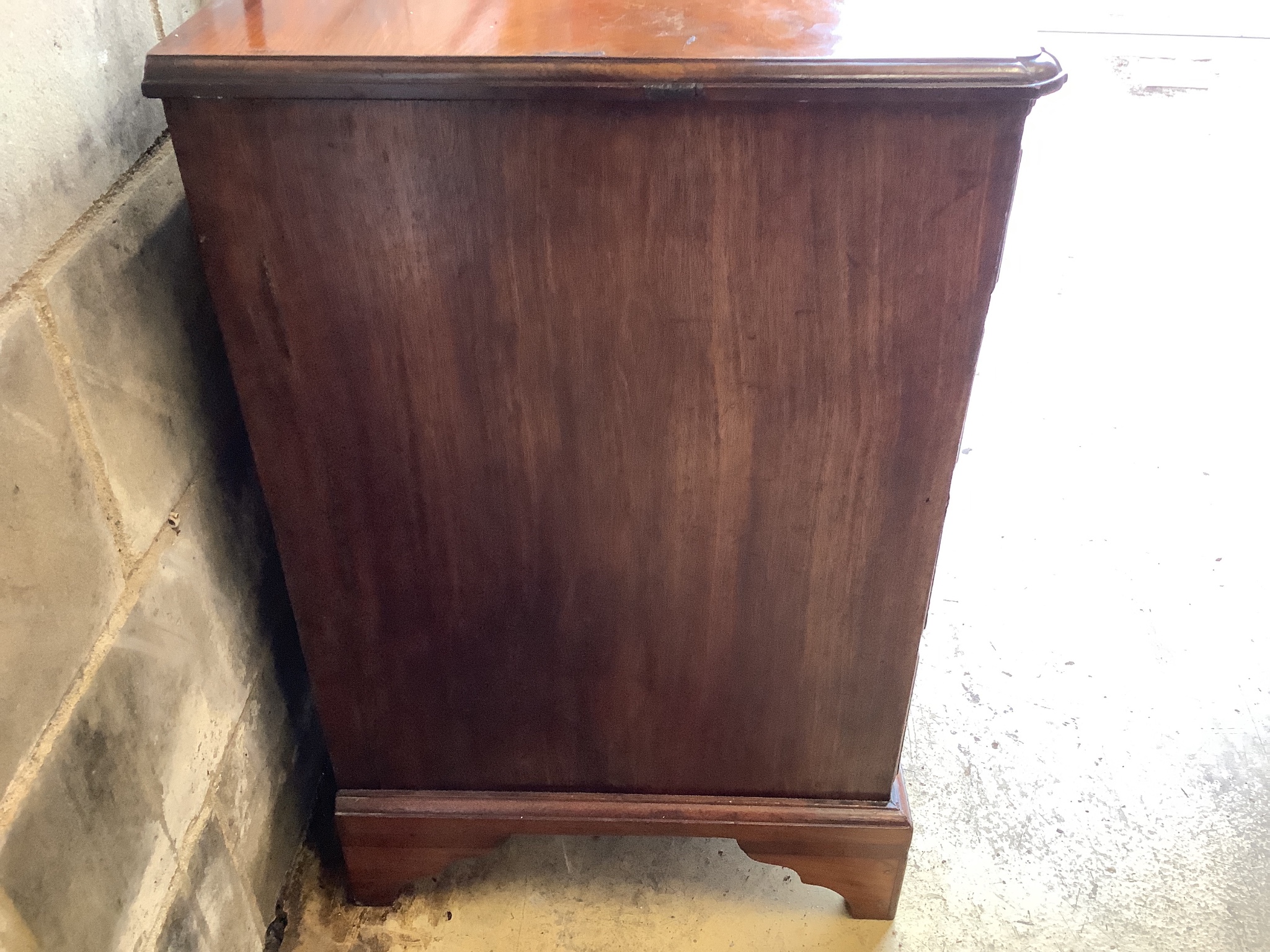 A small George III mahogany chest with slide, width 84cm, depth 51cm, height 80cm